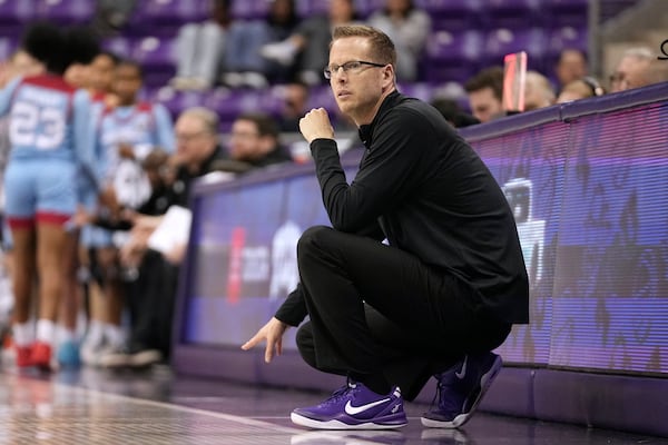 FILE - TCU head coach Mark Campbell watches play against Louisiana Tech in the second half of an NCAA college basketball game in Fort Worth, Texas, Sunday, Dec. 15, 2024. (AP Photo/Tony Gutierrez, File)