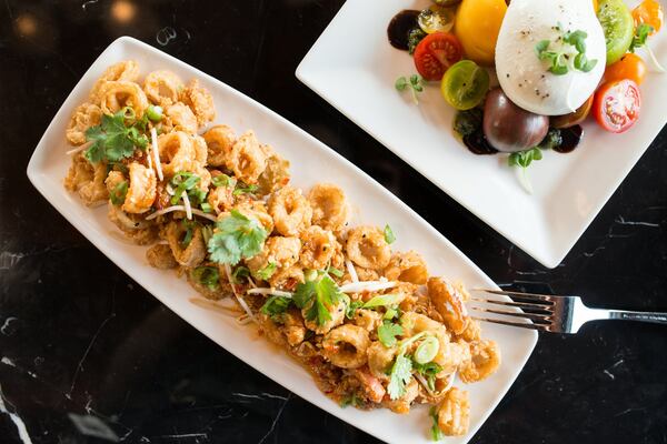 Shanghai-Style Fried Calamari with sweet chili glaze, bean sprouts, cherry peppers, crushed peanuts and scallions. Photo credit- Mia Yakel.