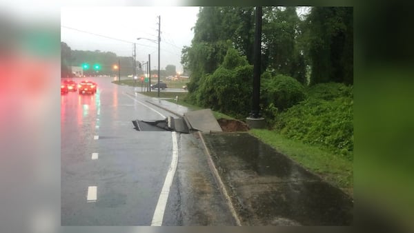 A right turn lane on northbound Scenic Highway at Henry Clower Boulevard is blocked due to wet weather.