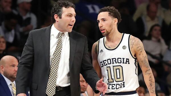 Georgia Tech coach Josh Pastner confers with guard Jose Alvarado in a tight contest with Dukeon Wednesday, January 8, 2020, in Atlanta.  Curtis Compton ccompton@ajc.com