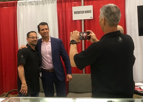  Donald Trump Jr. poses for a photo with Marfione Custom Knives owner Anthony L. Marfione. Photo: Jennifer Brett