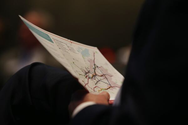 A map held by someone in the audience at the Infinite Energy Forum in Duluth on Wednesday, February 20, 2019 shows what MARTA would look like if the MARTA referendum passes. EMILY HANEY / emily.haney@ajc.com