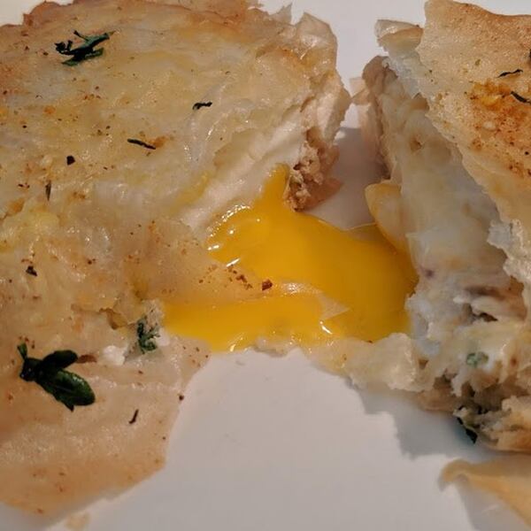 When you open a Phyllo-wrapped Fried Egg, you get some eggy, cheesy goodness. The recipe is from the cookbook “Chefs Eat Breakfast Too” by Darren Purchese. CONTRIBUTED BY PAULA PONTES