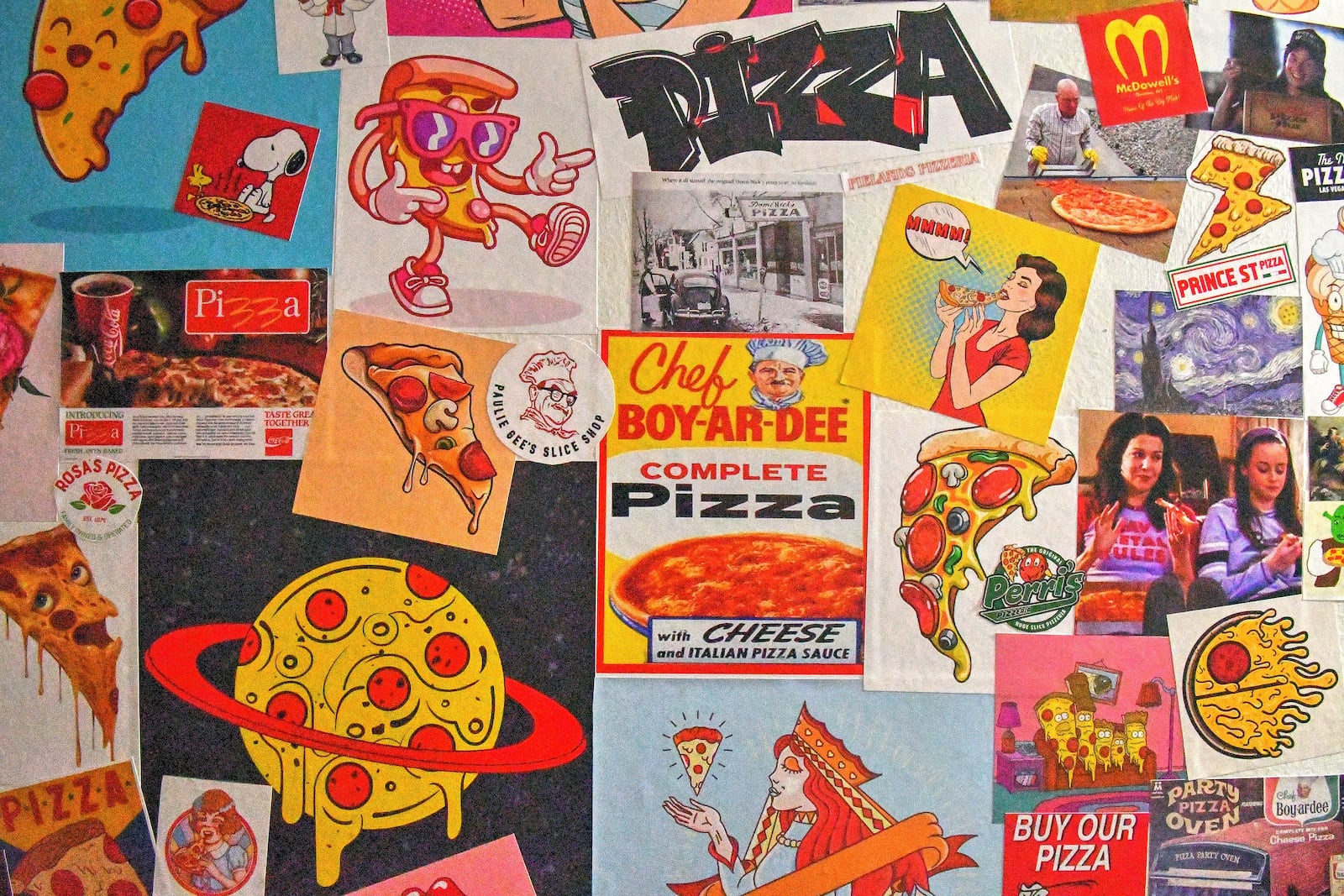 Floor-to-ceiling pizza-related stickers cover the bathroom's walls at Pielands Sub & Slice. (Chris Hunt for The Atlanta Journal-Constitution)