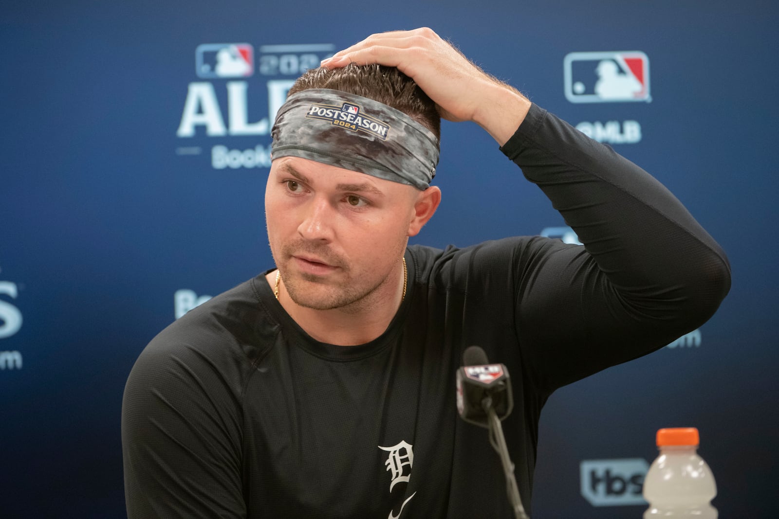 Detroit Tigers pitcher Tarik Skubal gestures during a press conference before a baseball workout in Cleveland, Friday, Oct. 11, 2024, in preparation for Saturday's Game 5 of the American League Division Series against the Cleveland Guardians. (AP Photo/Phil Long)