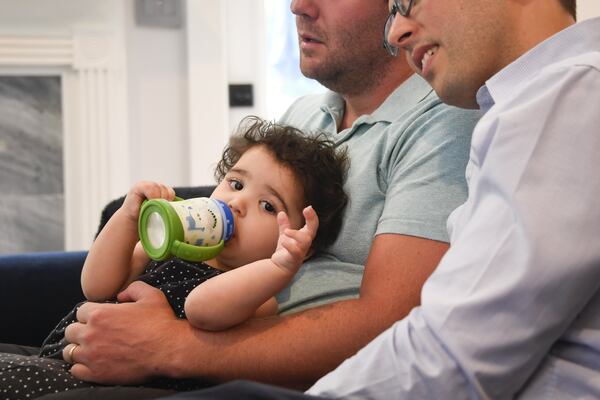 Simone is taking a break with her two fathers, Derek Mize and Jonathan Gregg. The couple are U.S. citizens, but the State Department is denying their daughter American citizenship. The men are suing the federal government on grounds of discrimination. 