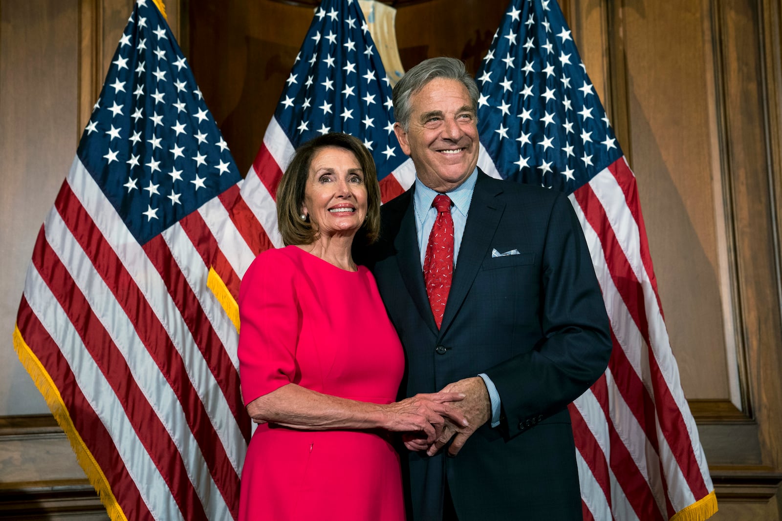 House Speaker Nancy Pelosi (D-Calif.) with her husband, Paul Pelosi, during the ceremonial swearing-in of the 116th Congress in the Rayburn Room of the U.S. Capitol in Washington, Jan. 3, 2019. Paul Pelosi was hospitalized after he was assaulted by someone who broke into the couple’s residence in San Francisco early on Friday morning, Oct. 28, 2022, a spokesman said. (Doug Mills/The New York Times)