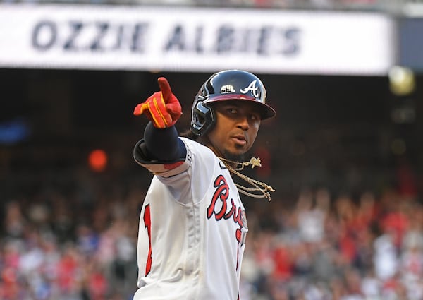 Braves' second baseman Ozzie Albies (1) celebrates after hitting a solo Homer in the first inning at Truist Park on Saturday, April 23, 2022. (Hyosub Shin / Hyosub.Shin@ajc.com)