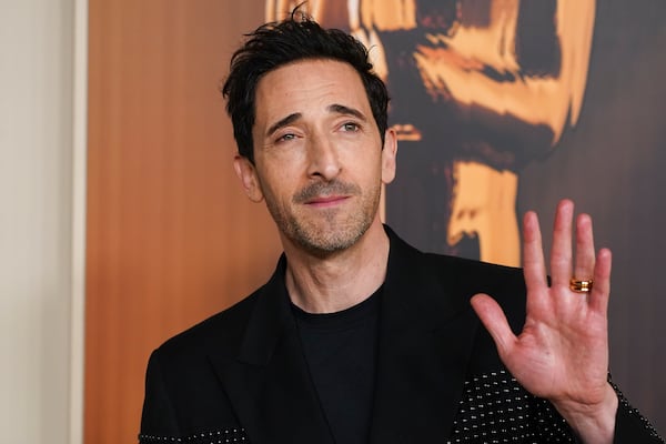 Adrien Brody arrives at the Oscars Nominees Dinner on Tuesday, Feb. 25, 2025, at the Academy Museum of Motion Pictures in Los Angeles. (Photo by Jordan Strauss/Invision/AP)