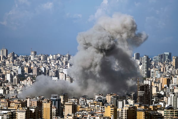 Smoke rises after an Israeli airstrike on Dahiyeh, in the southern suburb of Beirut, Lebanon, Saturday, Nov. 16, 2024. (AP Photo/Bilal Hussein)