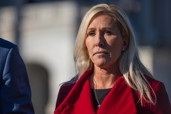 Congresswoman Marjorie Taylor Greene (R-GA) is seen at a press conference on border security as Congressman Tony Gonzalez (R-TX) talks on November 14th, 2023 in front of the Capitol in Washington, DC. (Nathan Posner for the Atlanta Journal-Constitution)