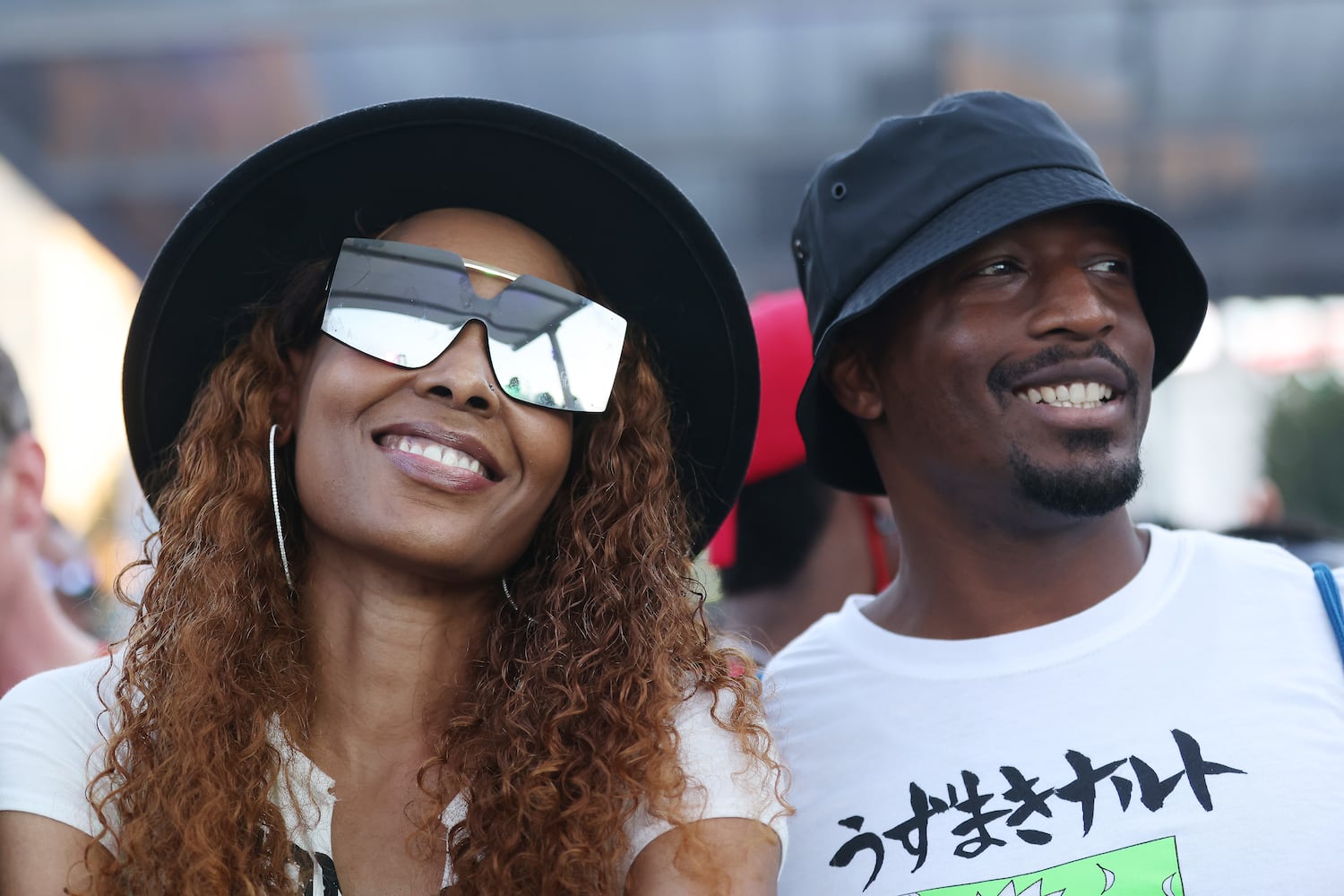 Patricia Holt and Nikolas Moore from Atlanta enjoy the music from the DJ moments before Big Boi appeared onstage. Sunday, October 10, 2021. Miguel Martinez for The Atlanta Journal-Constitution