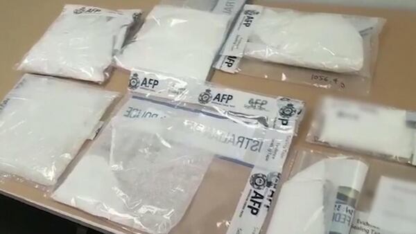 Police in Australia say flight crews smuggled drugs between Asia and Australia.