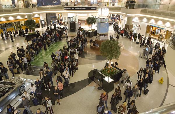 2/4/19 - Atlanta - Passengers spend the night at the airport after the Super Bowl. Delta Airlines handed out blankets and pillows to passengers spending the night in the airport instead of getting a hotel room. EMILY HANEY / emily.haney@ajc.com