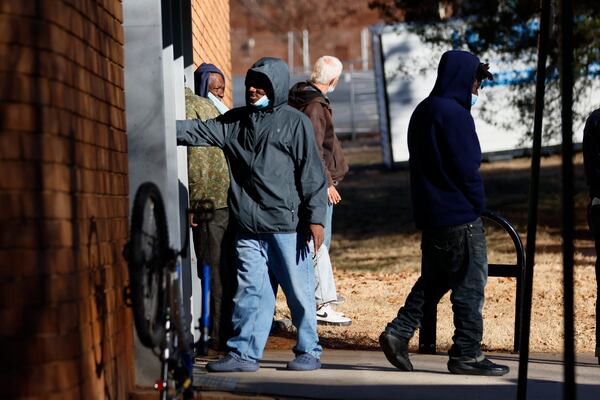 People are seen outside the Central Park Recreation Center in Atlanta on Wednesday, January 17, 2024. As of today, around 90 unhoused people have entered to seek shelter as the temperatures dropped below freezing in metro Atlanta; local authorities and nonprofits worked together to open warming shelters.
Miguel Martinez /miguel.martinezjimenez@ajc.com