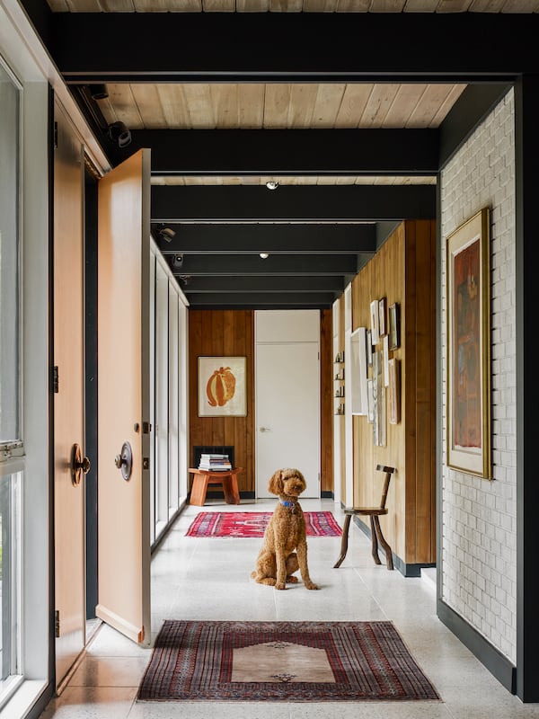 The father of Atlanta interior designer Jessica Davis collected an entryway rug in her foyer when traveling China's silk road in the 1980s. 
(Courtesy of Atelier Davis / Emily Followill)