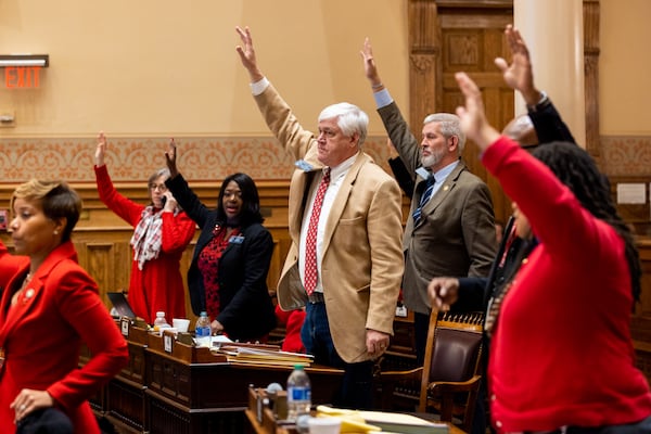 State senators take a hand vote on an amendment to a sports betting  bill in the Senate at the Capitol in Atlanta on Thursday, February 1, 2024. (Arvin Temkar/arvin.temkar@ajc.com)