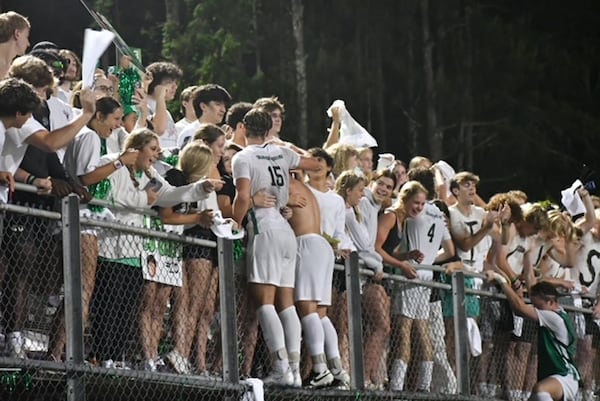 Liam Newton-Smith is an all-America soccer player at McIntosh High School. He helped the Chiefs win the state soccer championship in 2024 and celebrated with the students afterwards.