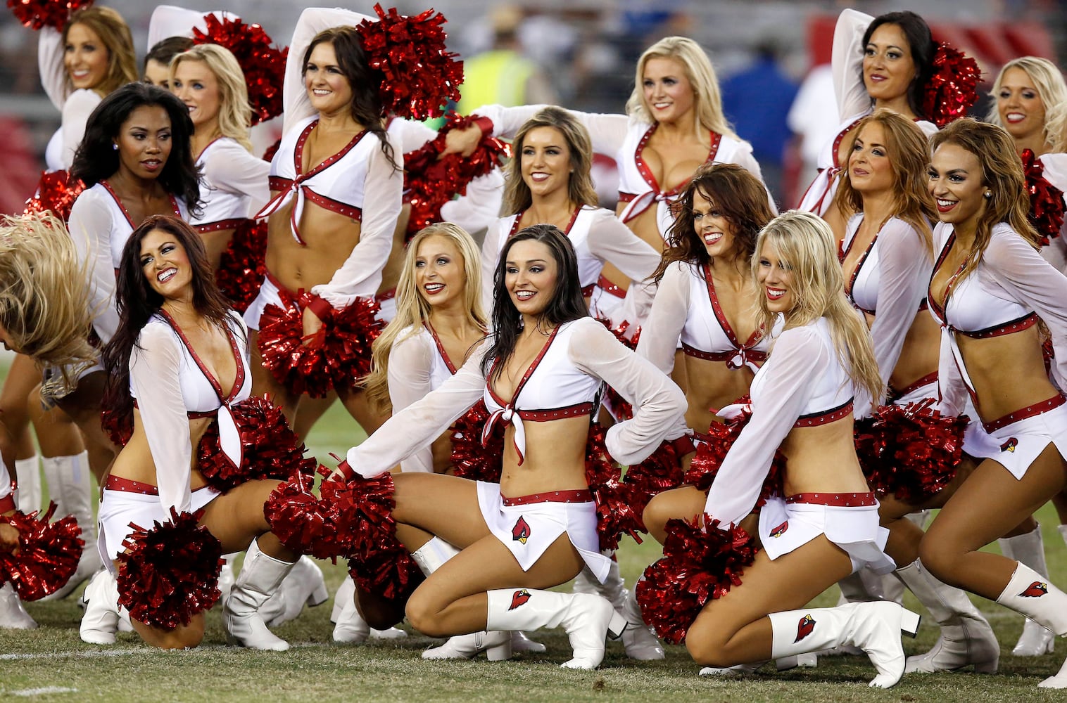 NFL cheerleaders perform at preseason games