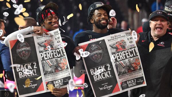 Georgia players celebrate their win in the 2023 College Football Playoff title game.