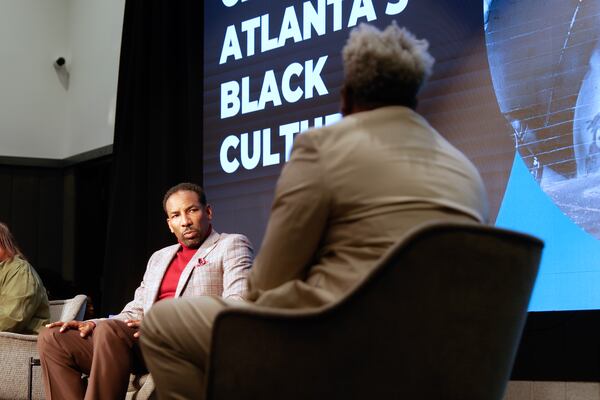 Atlanta Mayor Andre Dickens listens to a question from Atlanta Journal-Constitution reporter Ernie Suggs during The AJC’s Unapologetically Black live event at The Gathering Spot on Wednesday, March 22, 2023.  (Natrice Miller/ natrice.miller@ajc.com)