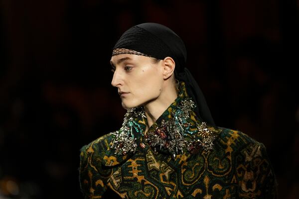 A model wears a creation as part of the Dries Van Noten Fall/Winter 2025-2026 Womenswear collection presented in Paris, Wednesday, March 5, 2025. (Photo by Scott A Garfitt/Invision/AP)