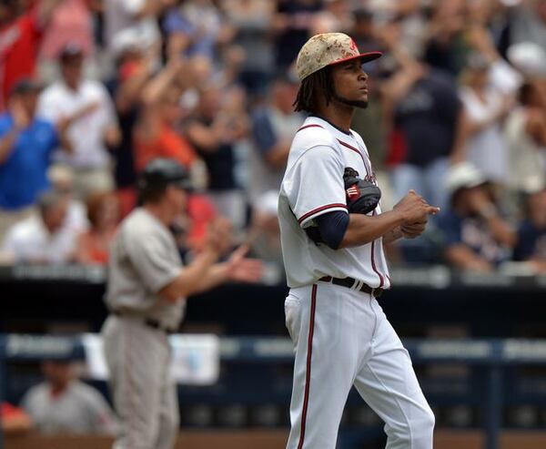 Ervin Santana contemplates the slider that didn't slide. (Brant Sanderlin/AJC)