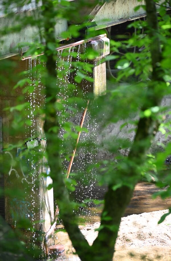 "Waterfall Communities" is a waterfall installation under Rickenbacker Bridge in Blue Heron Nature Preserve by Sylvia Cross and collaborators. Courtesy of Becca McCoy