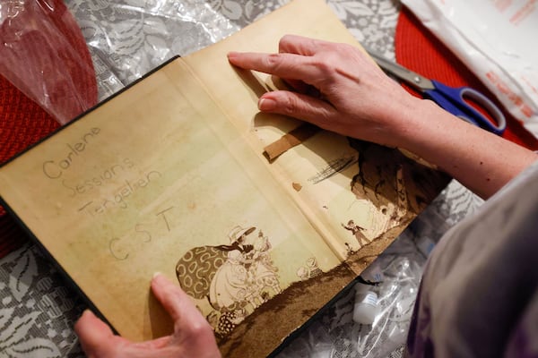 Carlene Tengelsen's handwritten name on the inside flap of a century-old storybook that a Florida woman was given as a gift about 15 years ago. Shown here, the book was recently mailed to Carlene's sister, Joanette Barnes, in Middle Georgia. Photo by Miguel Martinez /miguel.martinezjimenez@ajc.com