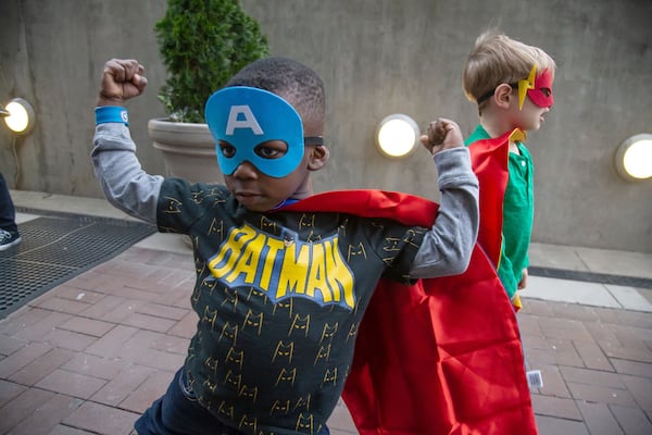 Wyatt Persons shows off his superhero costume before the start of the Superhero Science Night at the Children’s Museum of Atlanta Saturday, March 9, 2019. STEVE SCHAEFER / SPECIAL TO THE AJC