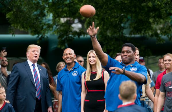 Herschel Walker, who has known Donald Trump since the 1980s, praised the former president at last year's Republican National Convention.  “Some people don’t like his style, the way he knocks down obstacles that get in the way of his goals,” Walker said of Trump. “People on the opposing team, they don’t like when I ran over them either. But that’s how you get the job done.” (Doug Mills/The New York Times)