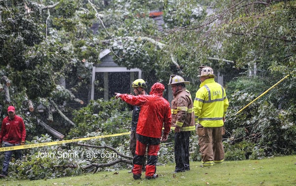 A 55-year-old Sandy Springs man was killed when a tree crashed into his home. JOHN SPINK/AJC