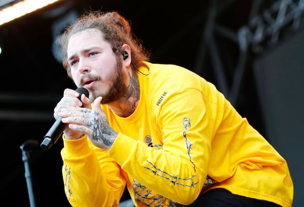 BALTIMORE, MD - MAY 19:  Musical artist Post Malone performs onstage during the 143rd Preakness Stakes on May 19, 2018 in Baltimore, Maryland.  (Photo by Paul Morigi/Getty Images for The Stronach Group)