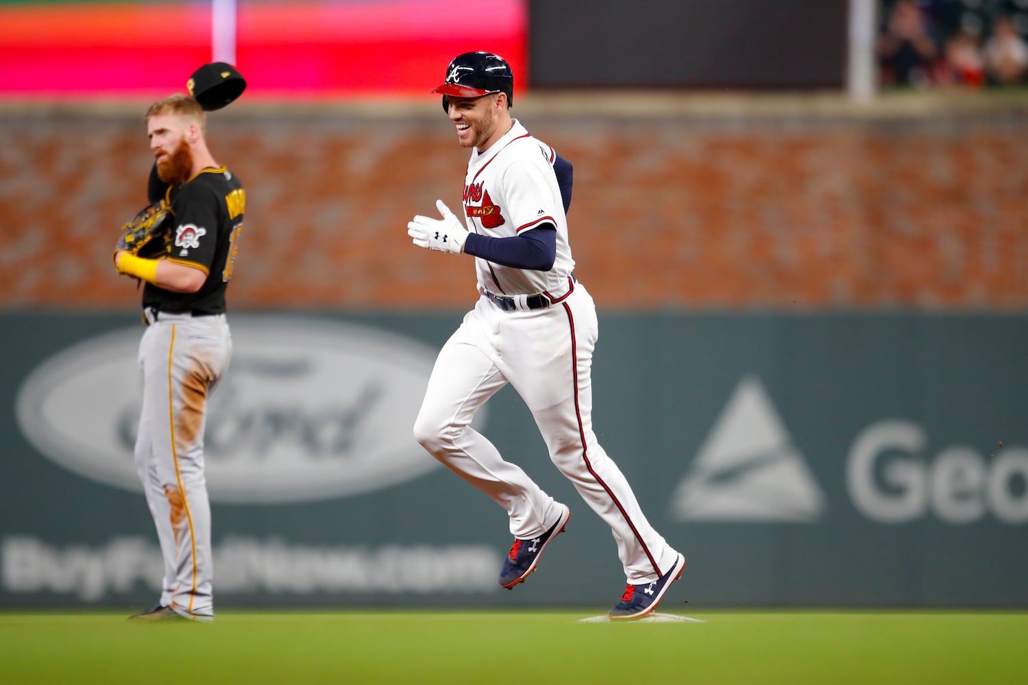 Photos: Fireworks early, late for Braves in big win over Pirates