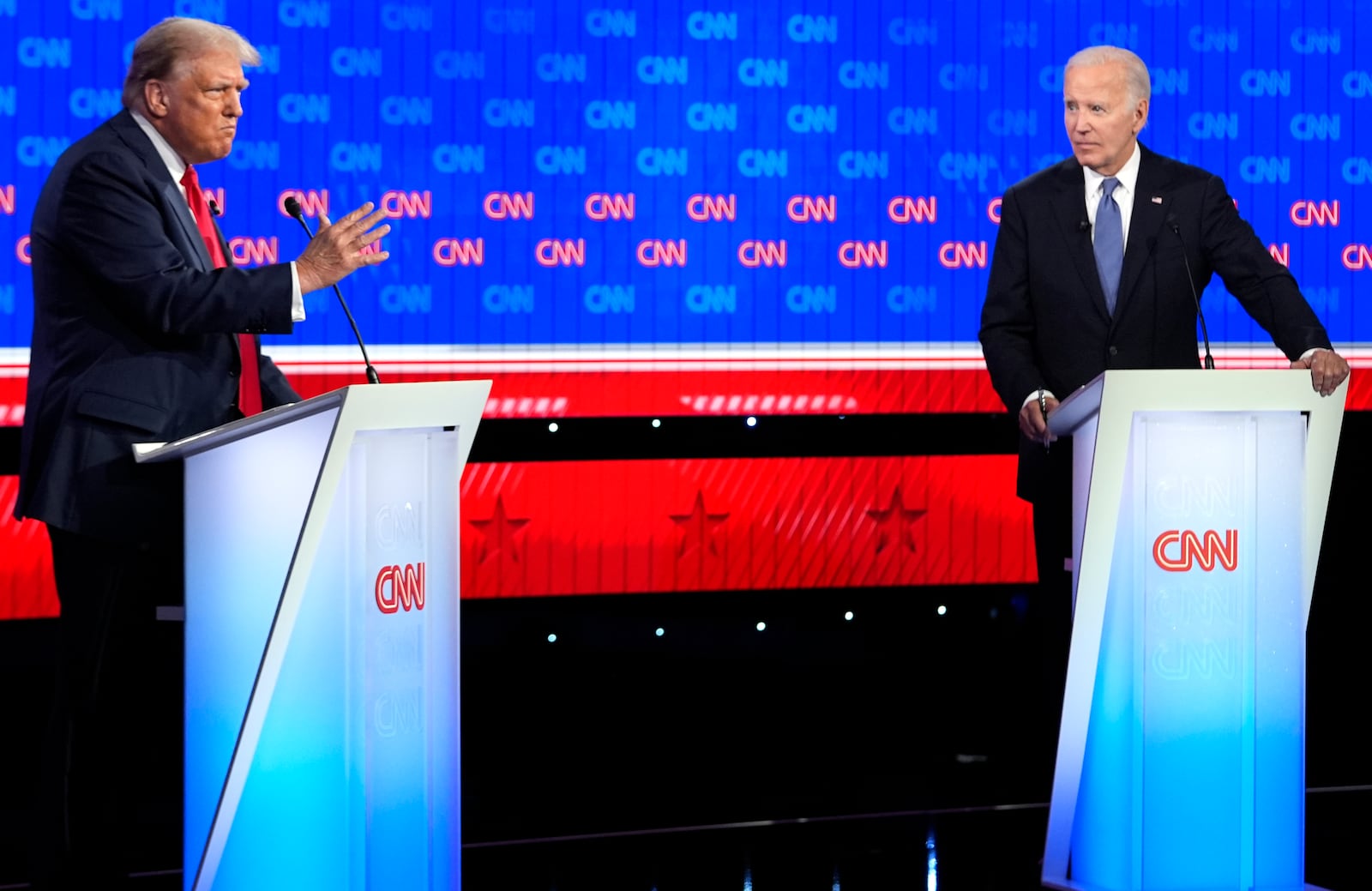 President Joe Biden, right, and Republican presidential candidate former President Donald Trump, left, participate in a presidential debate hosted by CNN, Thursday, June 27, 2024, in Atlanta. (AP Photo/Gerald Herbert)