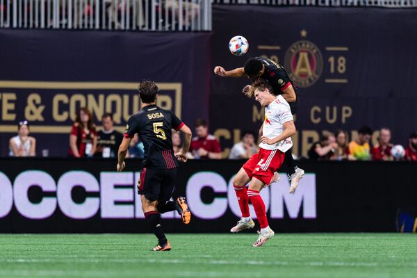 Atlanta United defender Miles Robinson (12) heads the ball during the match against New York Red Bulls Sunday, June 27, 2021, at Mercedes-Benz Stadium in Atlanta. (Jacob Gonzalez/Atlanta United)