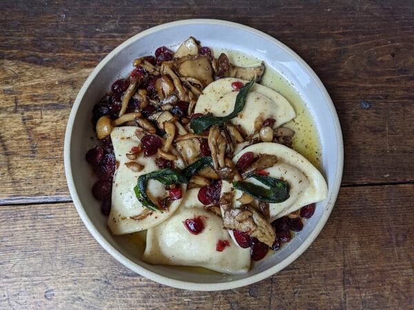 At the Porter Beer Bar, the pierogi are potato-filled crescents of dough served with wild mushrooms, cranberries and sage in brown butter. Courtesy of Molly Gunn