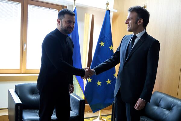 Ukraine's President Volodymyr Zelenskyy, left, meets French President Emmanuel Macron on the sidelines of the European Council to discuss continued support for Ukraine and European defense, in Brussels, Thursday, March 6, 2025. (Ludovic Marin, Pool via AP)