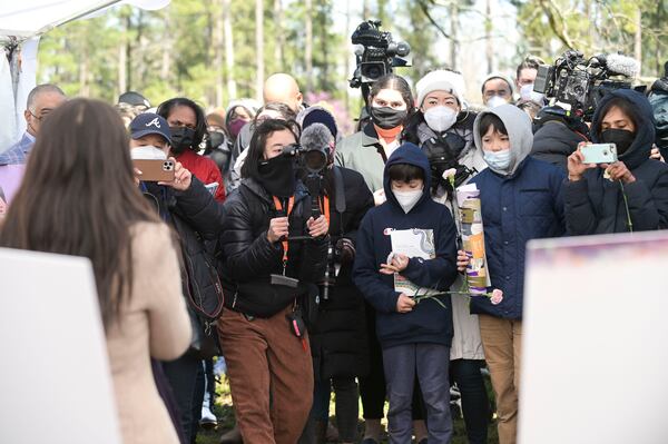 Residents gather at Blackburn Park off Ashford Dunwoody Road to pay tribute to the victims of last year's spa shootings Saturday, March 12, 2022. The event was sponsored by AsianAmerican area leaders just ahead of the one-year anniversary of the tragedy. (Photo: Daniel Varnado for The Atlanta Journal-Constitution)