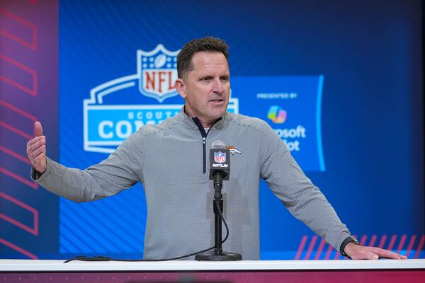 Denver Broncos general manager George Paton speaks during a press conference at the NFL football scouting combine in Indianapolis, Tuesday, Feb. 25, 2025. (AP Photo/Michael Conroy)