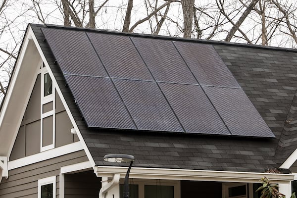 Views of a solar panel on top of the roof of a tiny cottage at The Cottages on Vaughan in Clarkston on Tuesday, Feb. 27, 2024. In 2019, DeKalb County approved the tiny home and cottage neighborhood that consists of eight homes that sit on half an acre. (Natrice Miller/ Natrice.miller@ajc.com)