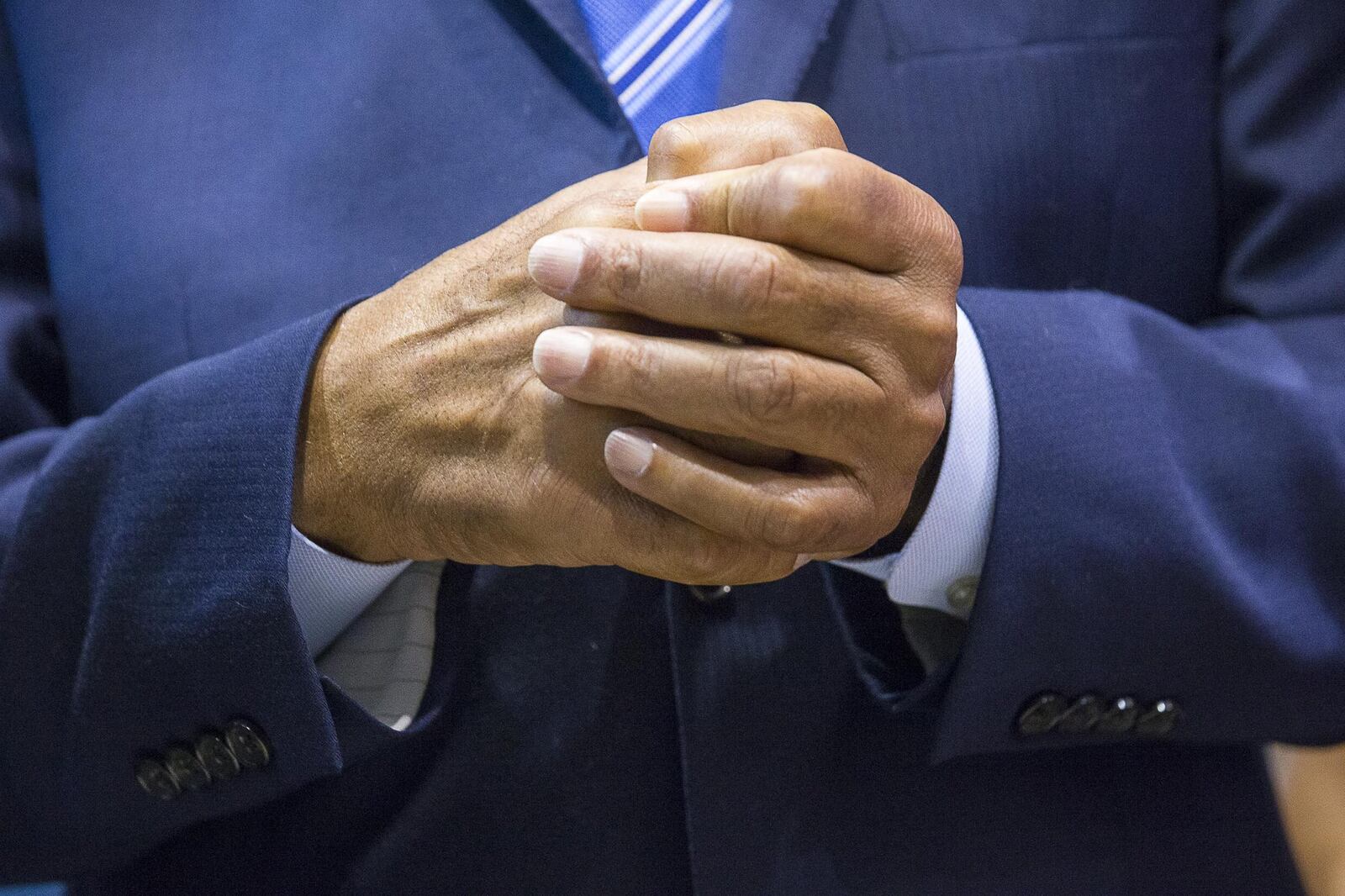 U.S. Rep. John Lewis clasps his hands during an interview following a ribbon-cutting ceremony for a new art exhibit that honors the civil rights leged in the atrium of the domestic terminal at Atlanta’s Hartsfield Jackson International Airport on Monday, April 8, 2019. 