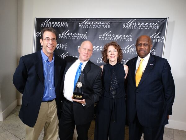 Talk show host Clark Howard, PD Pete Combs, Cox Media Group radio general manager Donna Hall and talk show host Herman Cain after WSB won its Marconi Award for best news/talk station. CREDIT: Rodney Ho/rho@ajc.com