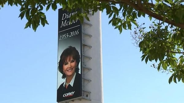 The towering Corey smokestack in Atlanta carried a portrait of Diane McIver, who was president of U.S. Enterprises Inc., parent company of Corey Airport Services.