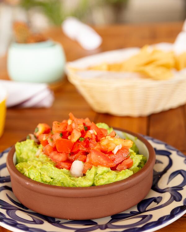 Guacamole is served with avocado, tomato, onion, cilantro, lime and fresh tortilla chips at Gezzo's Coastal Cantina. Courtesy of Order Up/Sharon Benton Studio