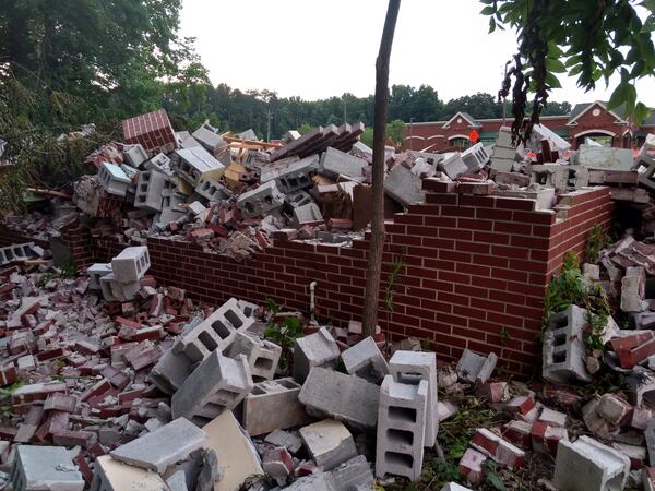 A small part of the brick exterior at the rear of the building after demolition.