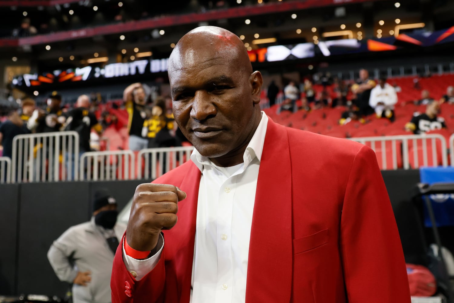 Former professional boxer Evander Holyfield poses for a photograph wearing the Falcons colors prior to the game between Atlanta and Pittsburgh on Sunday at Mercedes-Benz Stadium. (Miguel Martinez / miguel.martinezjimenez@ajc.com)