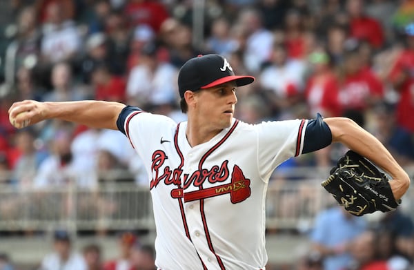 Braves' starting pitcher Kyle Wright (30) throws in the first inning at Truist Park on Saturday, July 23, 2022. (Hyosub Shin / Hyosub.Shin@ajc.com)