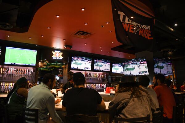 Here's what the Midtown location of Taco Mac looked like during the first half of Game 1 of the Eastern Conference finals between the Atlanta Hawks and Milwaukee Bucks. (Anjali Huynh/AJC)