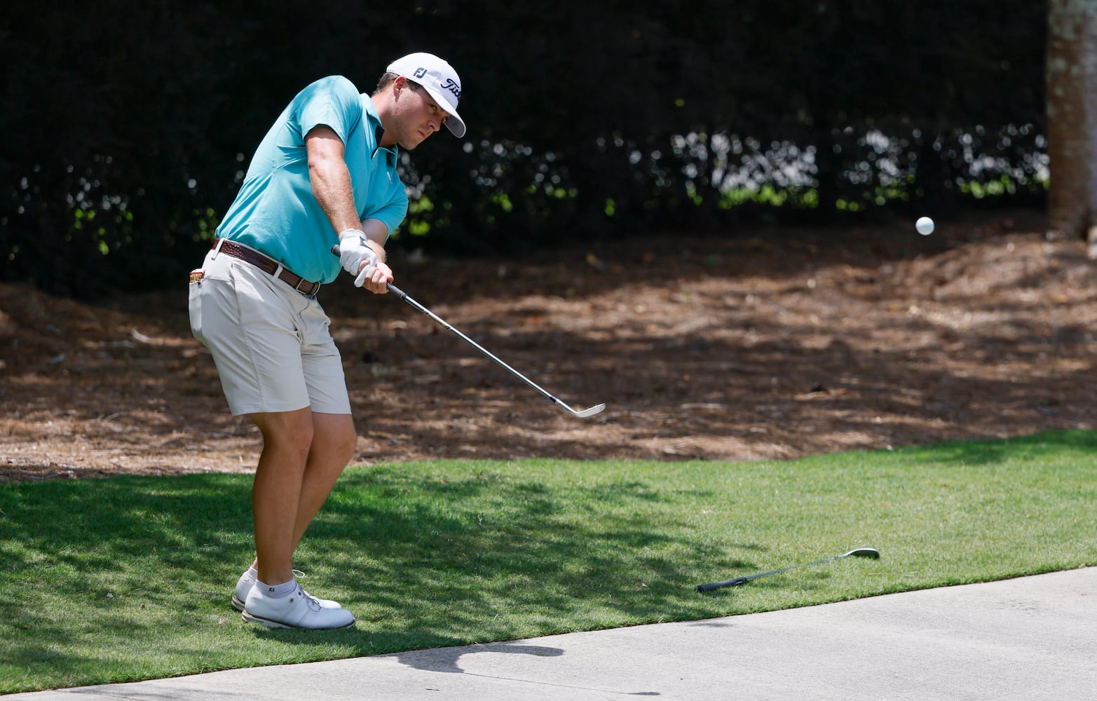 Jake Doggett, Midwestern State University, who finished 12 under par for sixth place, hits from just off the cart path during the final round of the Dogwood Invitational Golf Tournament in Atlanta on Saturday, June 11, 2022.   (Bob Andres for the Atlanta Journal Constitution)